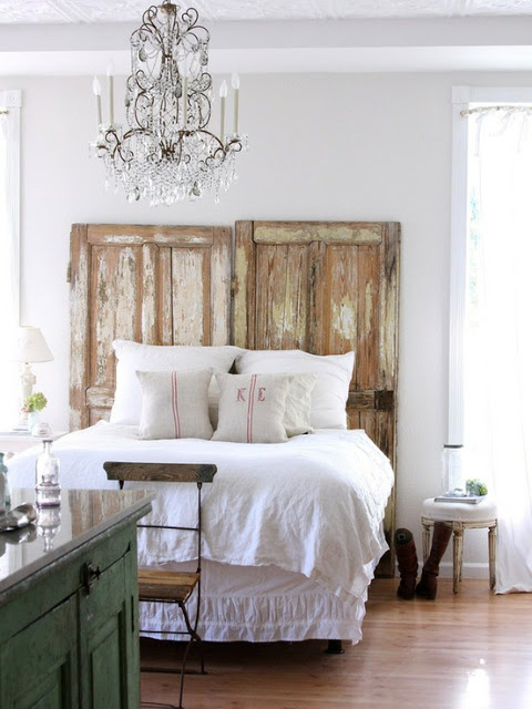 headboard made out of salvaged doors